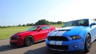 Showdown  2012 Chevrolet Camaro ZL1 vs 2013 Ford Mustang Shelby GT500  CAR and DRIVER [upl. by Narib154]