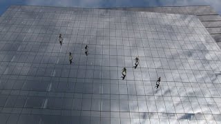 Dancers perform vertical routine across Boston building facade [upl. by Fortna]