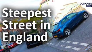 Driving Instructor Stalls and Wheels Spins on the Steepest Street in England [upl. by Arsuy969]