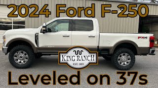 2024 Ford F250 King Ranch 25quot Leveled on 37sCUSTOM Covert Edition [upl. by Halilak471]