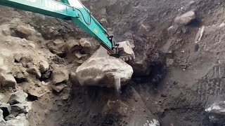 Large stones were successfully piled up by the excavator [upl. by Corri761]