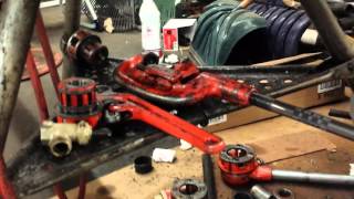 Using a Ridgid 300 tripod pipe threader [upl. by Lucien586]