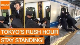 Passenger Squeezes Onto Tokyo Subway During Rush Hour [upl. by Alohcin]