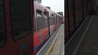 A Docklands Light Railway DLR unit arrives at Greenwich 170824 [upl. by Nysa696]