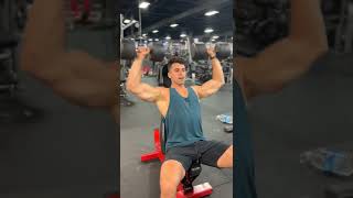 How to Properly Perform The Seated Dumbbell Shoulder Press With Good Form Exercise Demonstration [upl. by Pazia]