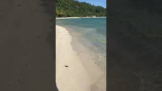 Walking along Matira Beach the most famous public beach at the southern tip of Bora Bora Island [upl. by Pyotr]