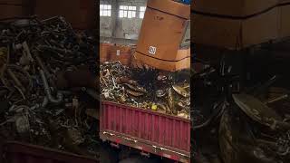 Metal scraps are loaded into trucks for recycling [upl. by Hnoj403]