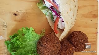 Falafel Sandwich with hummus Middle Eastern Style By Tasty Street Food [upl. by Niarfe395]