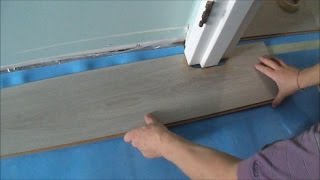 Installing LaminateCork Flooring without Transitions How to Pass a Door Jamb MrYoucandoityourself [upl. by Akayas]