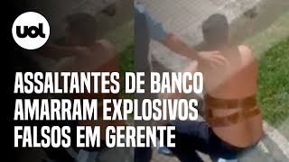 Ladrões amarram explosivos falsos no corpo de gerente para assaltar banco em MG [upl. by Nelra]