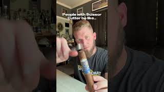 Cigar 101 Cutting your cigar with a scissor cutter [upl. by Deryl]