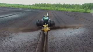 Bog clearing Meripeat OJK13 screw type ditcher in ditch opening [upl. by Aiket]