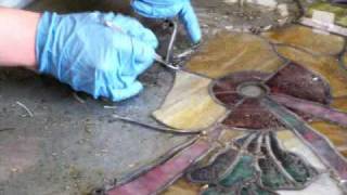 Disassembling a stained glass panel for restoration [upl. by Fayina]