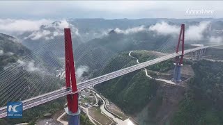 New towering bridge opens to traffic in Chinas mountainous Guizhou Province [upl. by Bohun]