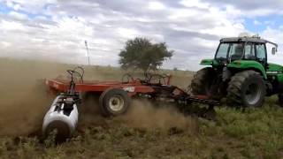 Agco Allis 6150 con rastra ombu de 56 discos [upl. by Enomed]