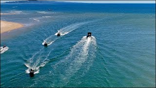 Aerial Drone footage of boats crossing the Noosa Bar [upl. by Ynnot]