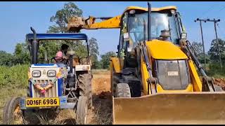 jcb3dx eco excellence backhone machine loding mud in swaraj 735 tractor  jcb and tractor video [upl. by Dollar]