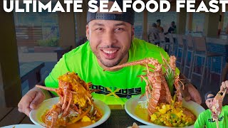 MASSIVE SEAFOOD FEAST OF KING CRAB LOBSTER AND FISH JAMAICA FOOD HISTORY AND CULTURE [upl. by Oiramed68]