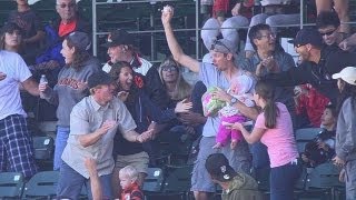 Fan makes a great catch with baby in hand [upl. by Marala665]