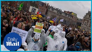 Antilockdown protesters take to the streets of Amsterdam defying ban [upl. by Harmaning968]