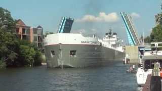 Manitowoc Great Lakes Freighter Navigates Narrow Channel In Manistee Michigan [upl. by Eednarb]