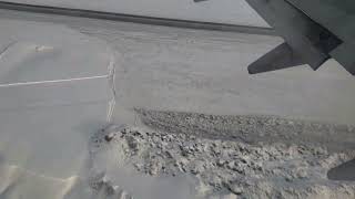 Winter Flight over Icy Alaska and plane landing at Anchorage Airport [upl. by Gil400]