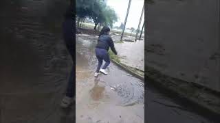 Girl Attempts to Jump Over Puddle and Falls [upl. by Irrak]