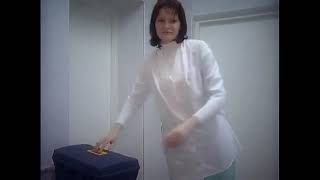 Female Nurses are Wearing Hazmat Suit and Gasmask in Room [upl. by Lienet163]