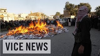 ISIS Rebels Burn a Pile of Cigarettes and Alcohol in Syria This Just In [upl. by Emiolhs]