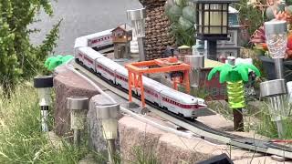 TYCO Streamliner cars klickety klack￼ around the garden railroad at high speeds with Athearn SP F7 [upl. by Ahseinad]