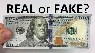 How to Tell if a 100 Bill is REAL or FAKE [upl. by Neeruan]