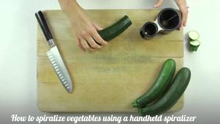 How to spiralize vegetables using a handheld spiralizer [upl. by Demitria]