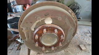 Installing New Brake Shoes Springs to the Massey Ferguson 35 835 Tractor [upl. by Bellda276]