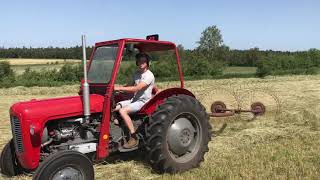 Raking hay with Vicon Acrobat and Massey Ferguson 35 [upl. by Ailbert137]