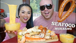 KING CRAB LOBSTER SEAFOOD BOIL  SAUSAGE CHEESE SAUCE MUKBANG LETS EAT  SASVlogs [upl. by Aseefan]