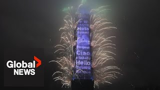 New Years 2023 Taiwan shoots fireworks off Taipei 101 skyscraper [upl. by Aratahc]