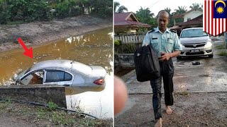 Guru heroik selamatkan keluarga yang terjatuh di parit  TomoNews [upl. by Ymmit]