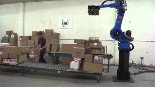 Motoman robot depalletising randomly positioned boxes [upl. by Jermyn]