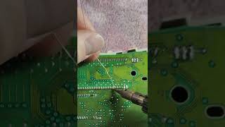 Weller Butane soldering Iron reflowing solder joints [upl. by Etteloiv371]