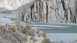 Tourists crossing Hussaini suspension bridge  Oxus Inn Hunza  Hunza River [upl. by Akcira241]