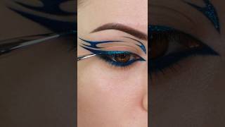 BLUE GRAPHIC LINER TUTORIAL eyeliner eyelinertutorial graphicliner glittermakeup makeuptutorial [upl. by Dinan]