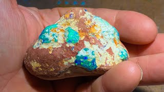 Uncut gem opal cluster in sandstone Lets see what’s inside [upl. by Eihtak]