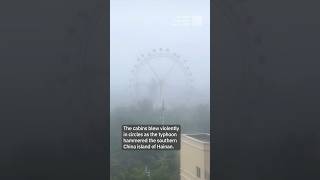 Ferris wheel cabins spin violently as Typhoon Yagi hits southern China’s Hainan Island [upl. by Drexler728]