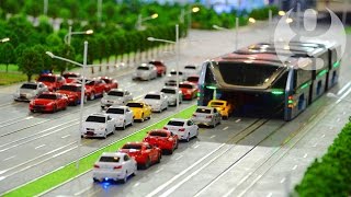 Bus that moves above traffic jams unveiled in China [upl. by Nessaj661]