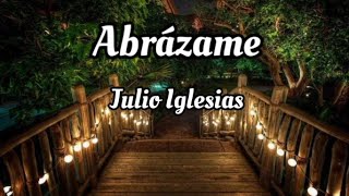 Julio Iglesias  Abrázame letra [upl. by Acimahs]