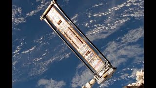 RollOut Solar Array Makes Space Station Debut [upl. by Timothee692]