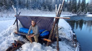 HOT ROCKS in my Bushcraft Cot  Winter Camping in Alaska with a Survival Shelter [upl. by Benedetta]