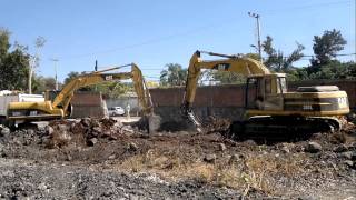 tres excavadoras CAT 320 trabajando [upl. by Leffen313]