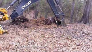 Digging an old Pine Stump with the John Deere Backhoe [upl. by Hamrah329]