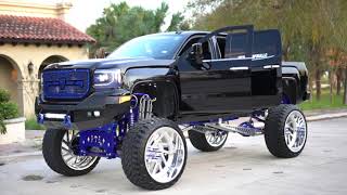 2019 GMC Denali 1500 on HUGE 30 inch wheels with a 17 inch Coil over lift kit [upl. by Yorker239]